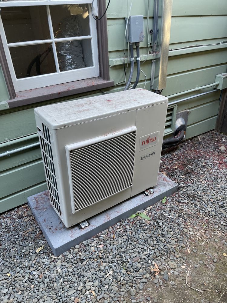 Outdoor Fujitsu mini-split condenser unit installed by E-fficient HVAC in Oakland
